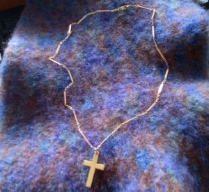 rose gold chain and cross