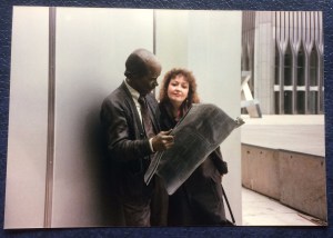 Man reading newspaper and me